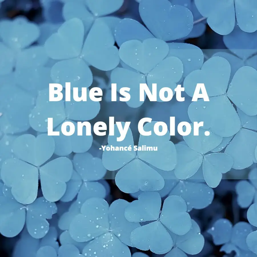 Blue Is Not A Lonely Color motivational quote on flowers and the color blue.